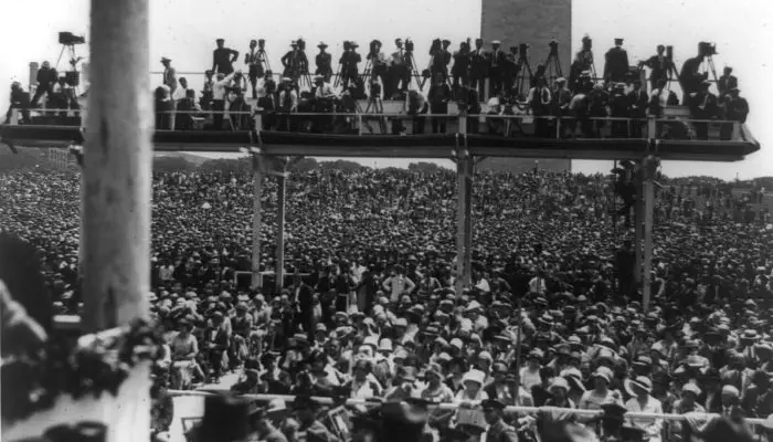 Photographers on platform above crowd at Charles A. Lindbergh speech at the Washington Monument in Washington, D.C.