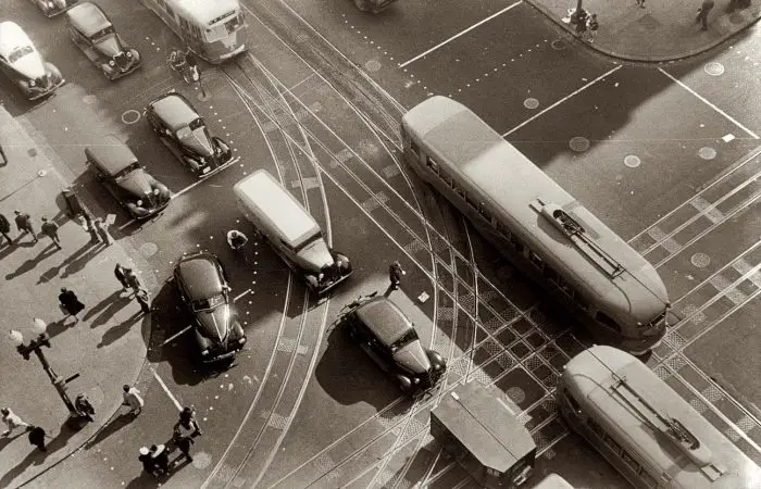 Aerial view in front of the Willard Hotel at 14th Street and Pennsylvania Avenue, showing pedestrians and rather dense traffic in autos and streetcars. - 1939