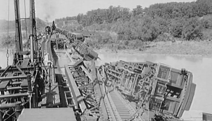 Wreck of the Crescent Limited train on the Pennsylvania Railroad Bridge over the Anacostia River in Washington, D.C., in the United States. Flood waters from a storm undermined the bridge's pilings, which led to the crash on August 24, 1933. The engineer died in the wreck. (Library of Congress)